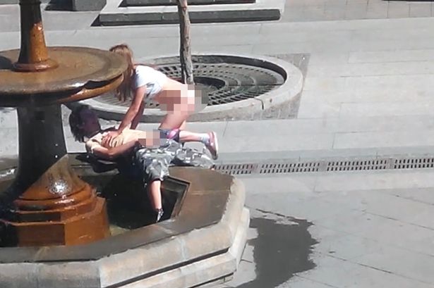 Police Hunt Pair That Had Full On Sex Next To A Fountain in Russia